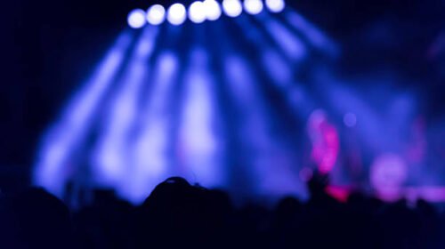 defocused stage lights/spotlights at the concert