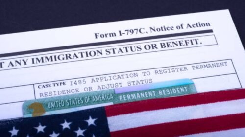 Form I-797 C, Notice of Action, Case type I 485 Application to register Permanent residence or adjust status next to Green card coveredwith Flag of USA.