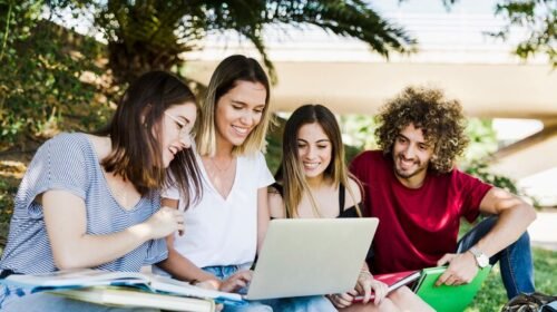 students-using-laptop-park_23-2147850706